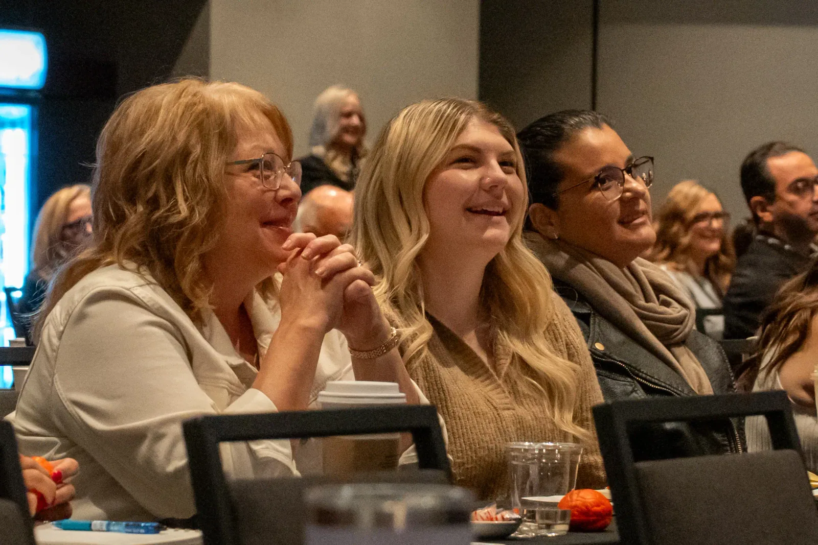 Attendees laughing together at the Growth Summit