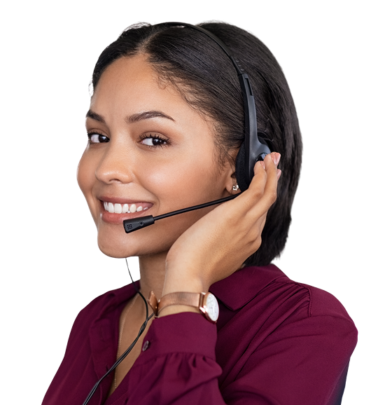 A person with a headset smiles, wearing a maroon shirt, against a plain background, seeming engaged in a conversation or customer service role.
