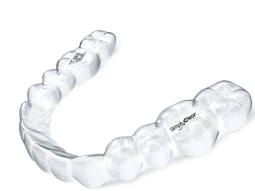 A clear orthodontic aligner featuring multiple teeth impressions, designed for dental correction. The surface has subtle contour patterns and a logo.