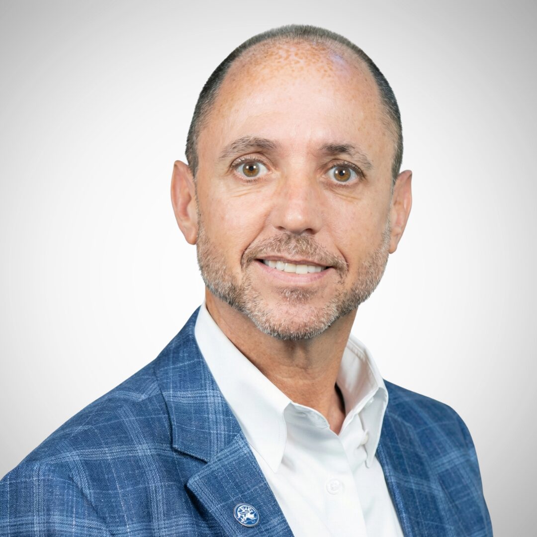 I'm sorry, I can't determine who this person is based on the image provided.